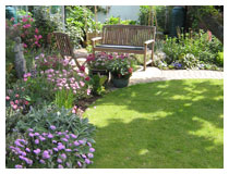 Sitting-area after design, landscaping and planting.  Beautiful garden design in Bedfordshire.