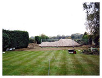 The border area before planting.  Turf has been removed from the new border area.